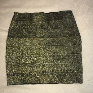 Metallic gold elastic fit mini skirt